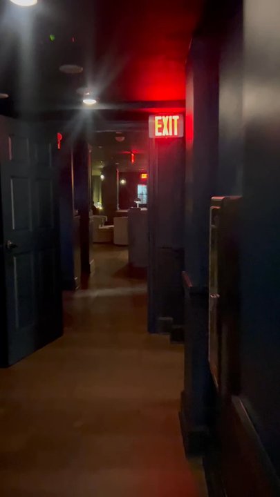 May Peel - Walking inside - Speakeasies Near Me - Atlanta, Georgia