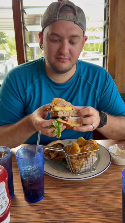 Coconut Grill - This burger was dripping juicy and so flavorful... Too big to fully bite in one go. - American Near Me - Hilo, Hawaii