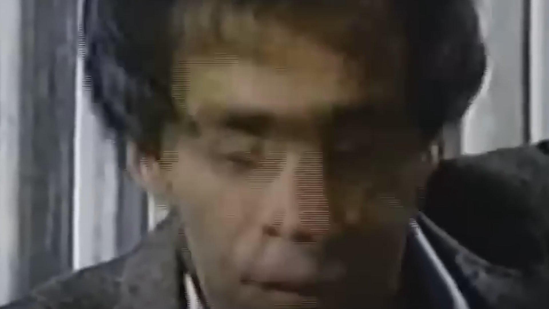 Television producer Chuck Barris reflects on his career in an archival interview segment, culminating in a historical reference to the 1965 premiere of The Dating Game.