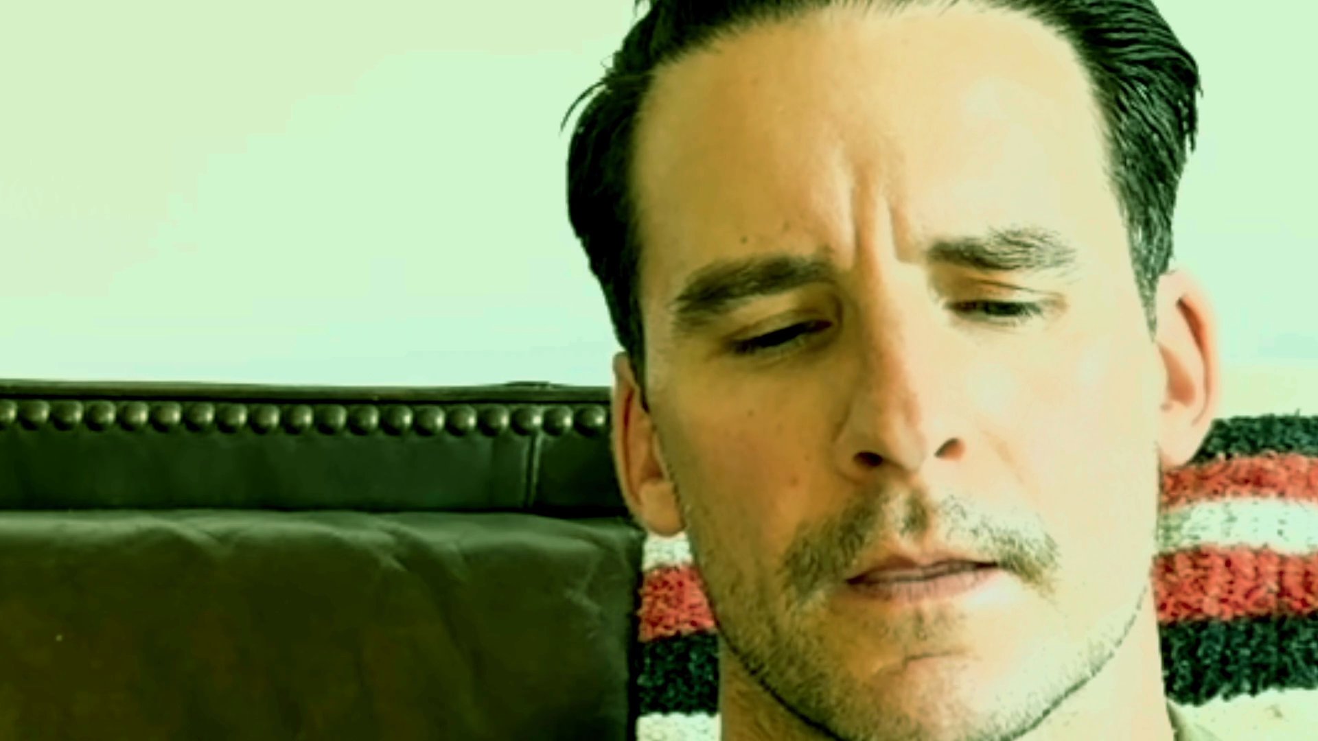 A woman and a man engage in a sequential conversation, speaking directly to the camera in separate shots. The exchange highlights individual perspectives through alternating framing.