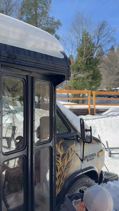 Mountain Coffee - School bus with table and seating inside - Coffee & Tea Near Me - Lake Arrowhead, California