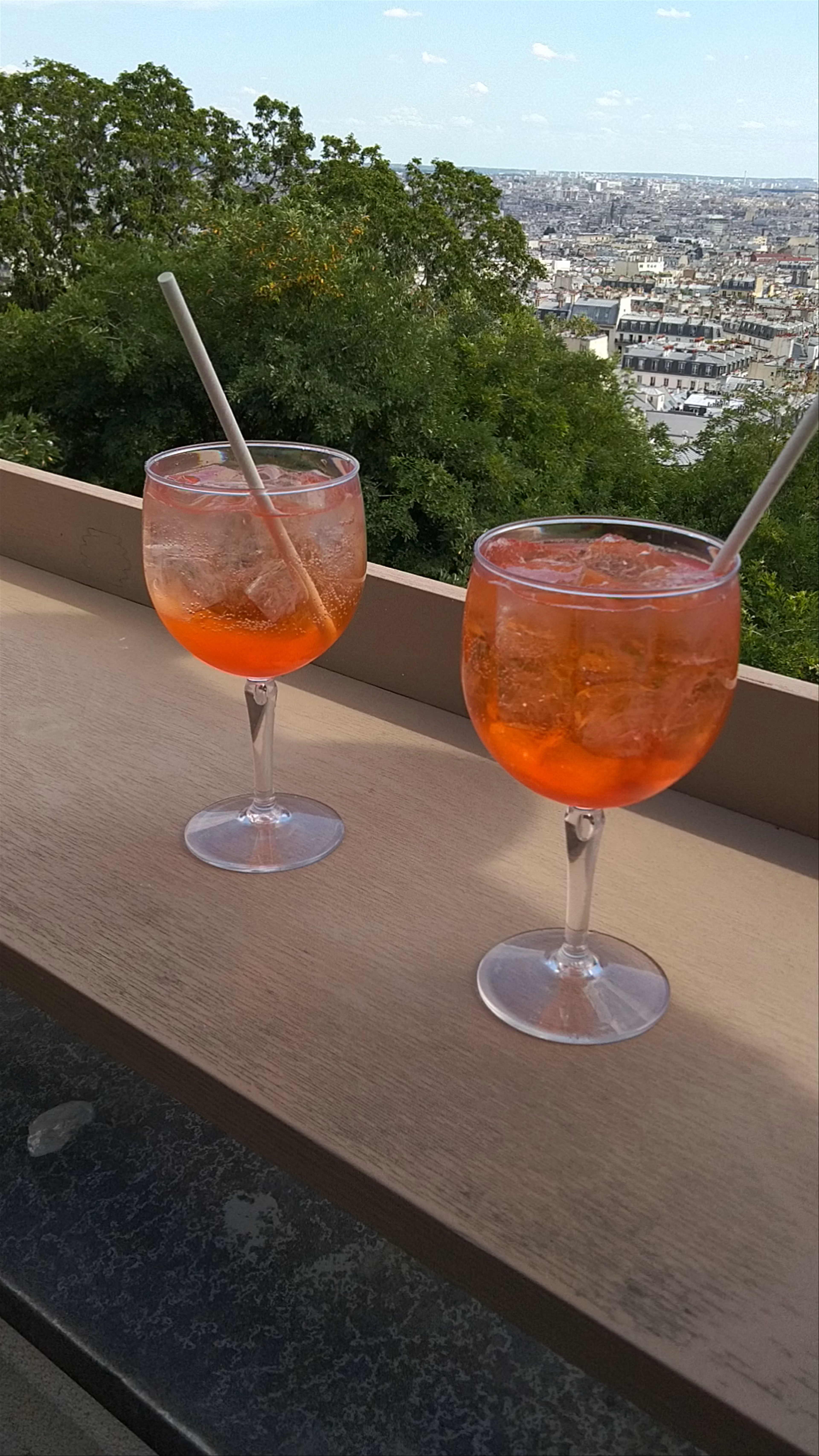 Sunny Afternoon Aperol Spritz with Paris Cityscape Views