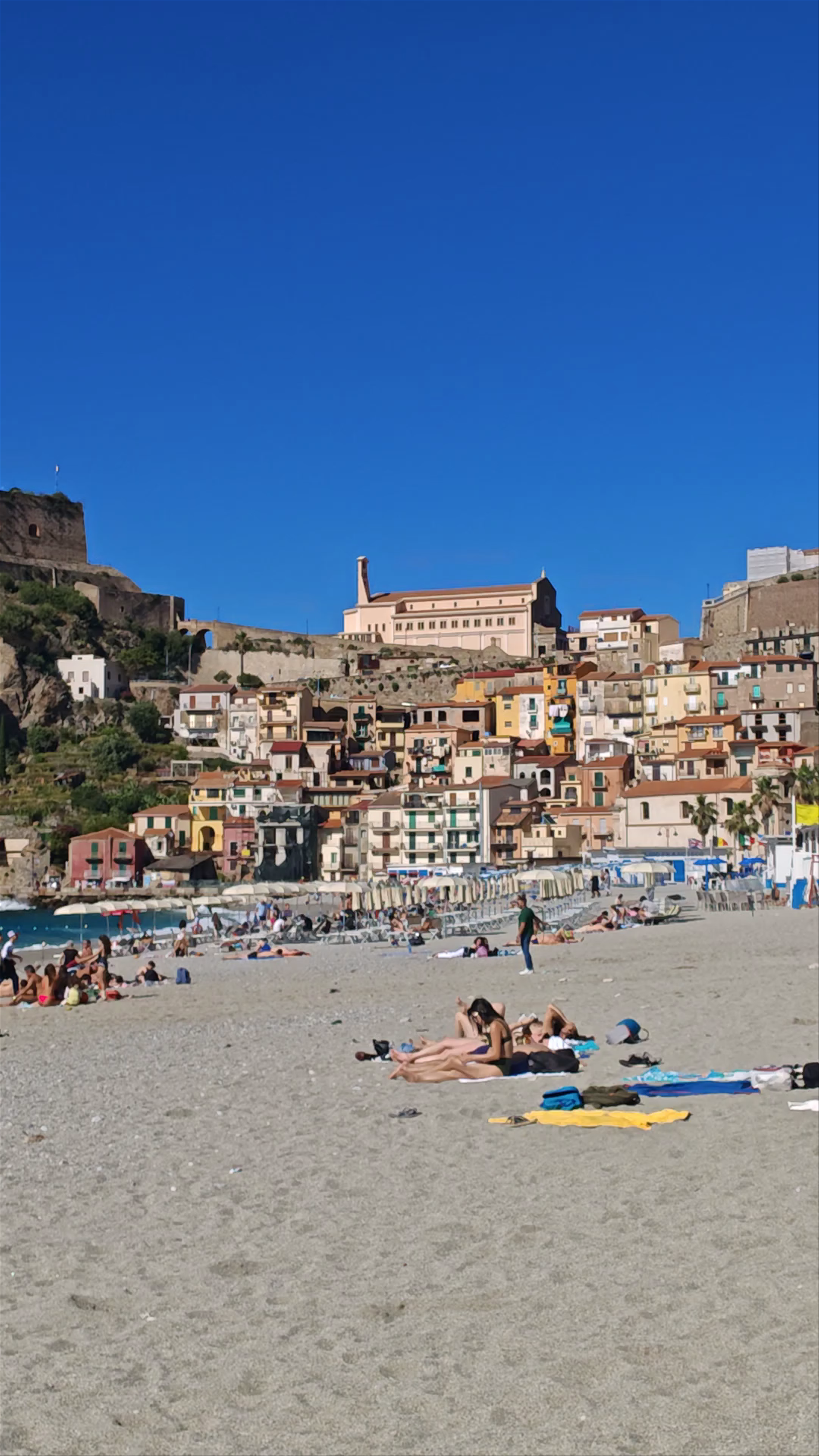 Sunny Beach Day at Spiaggia Di Scilla, Italy