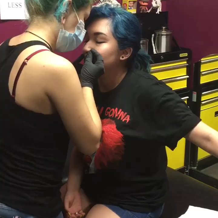 Oasis Tattoo & Body Piercing - This is Zoe piercing a septum - Tattoo Near Me - Indio, California