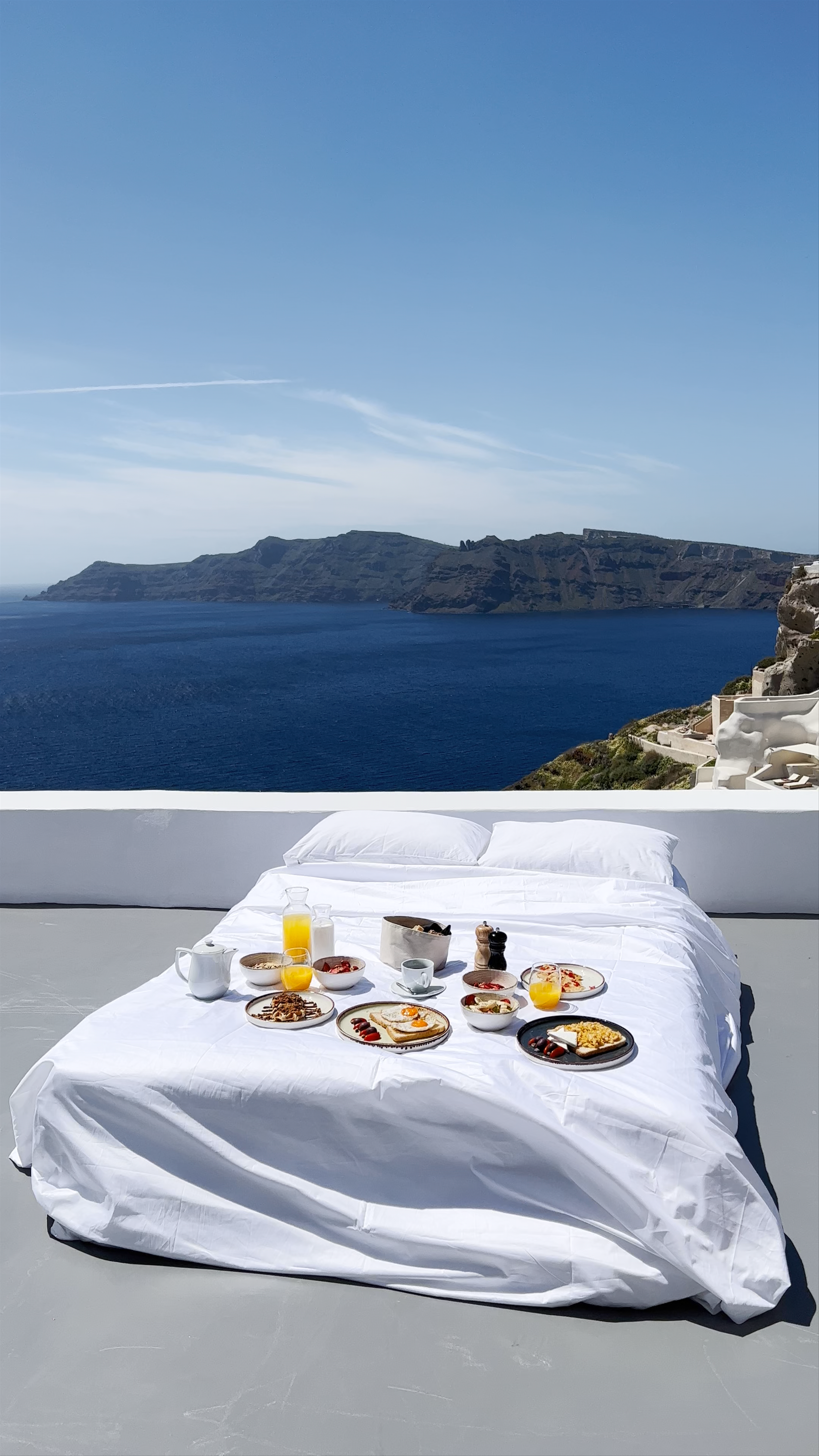 Sun-Soaked Breakfast with Caldera Views at Echoes Luxury Suites, Oia