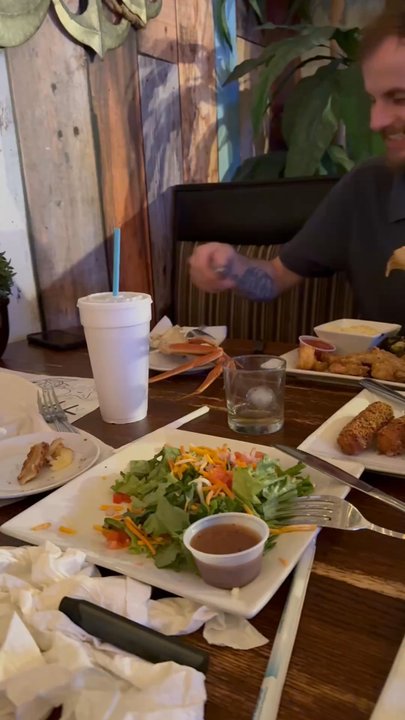 C Level - Our son trying snowcrab for the first time and loving it! - Bars Near Me - Panama City Beach, Florida