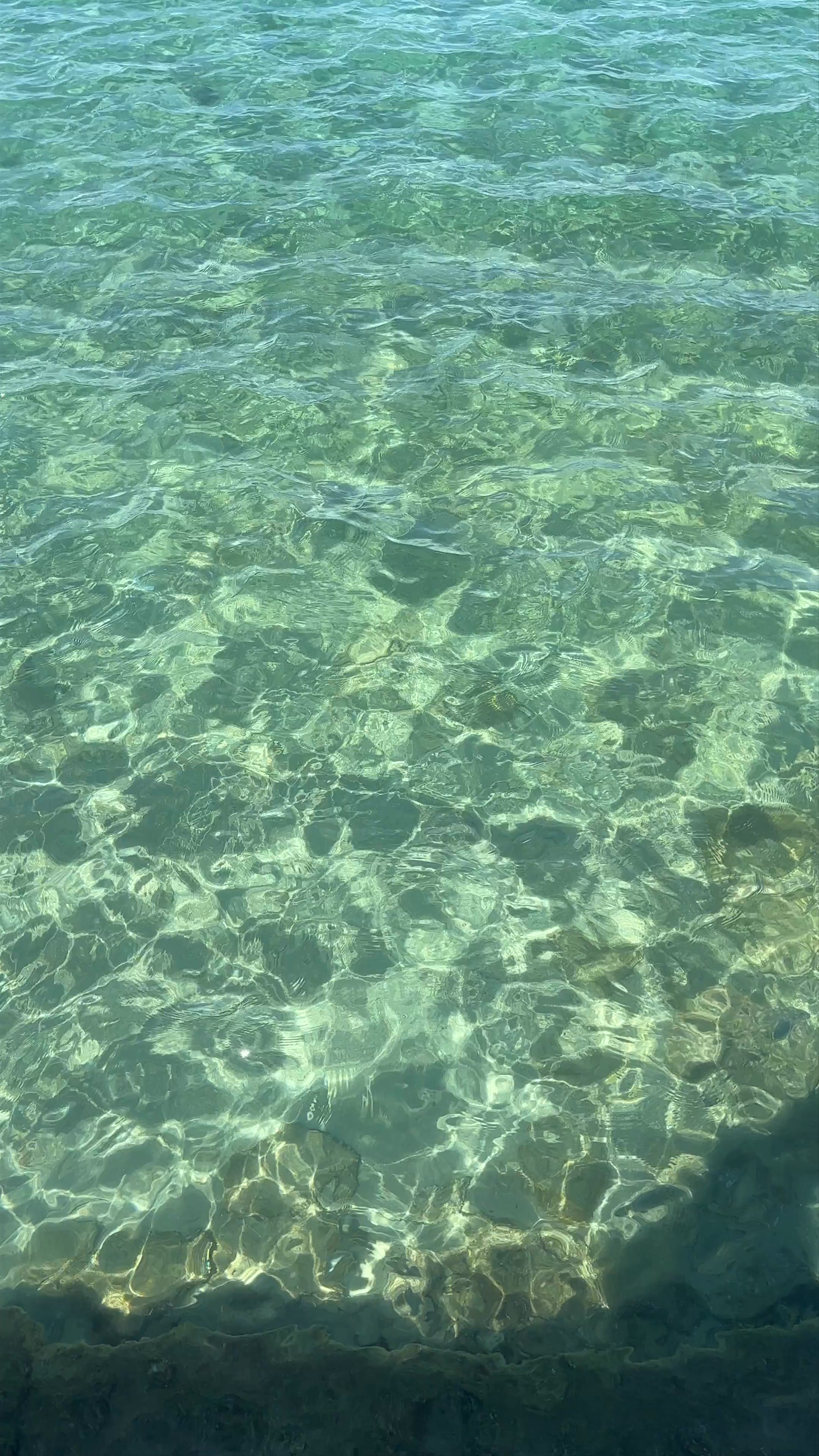 Crystal-Clear Waters and Sunny Skies at Ilıca Yıldızburnu Beach, Çeşme