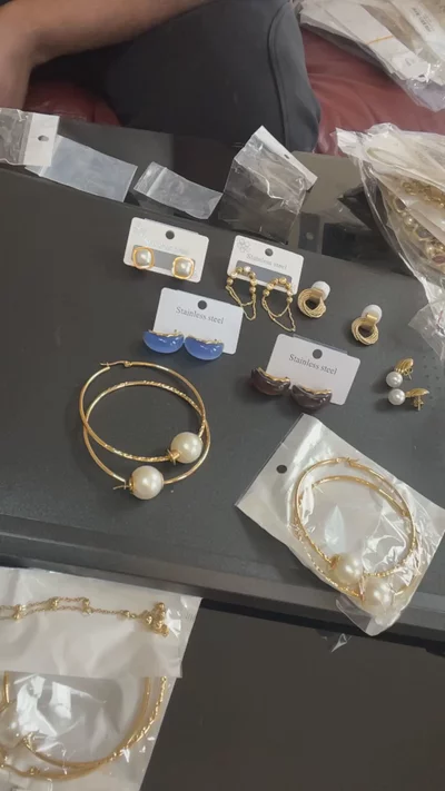 Gold Hoop Earrings With Pearl Detail image 1