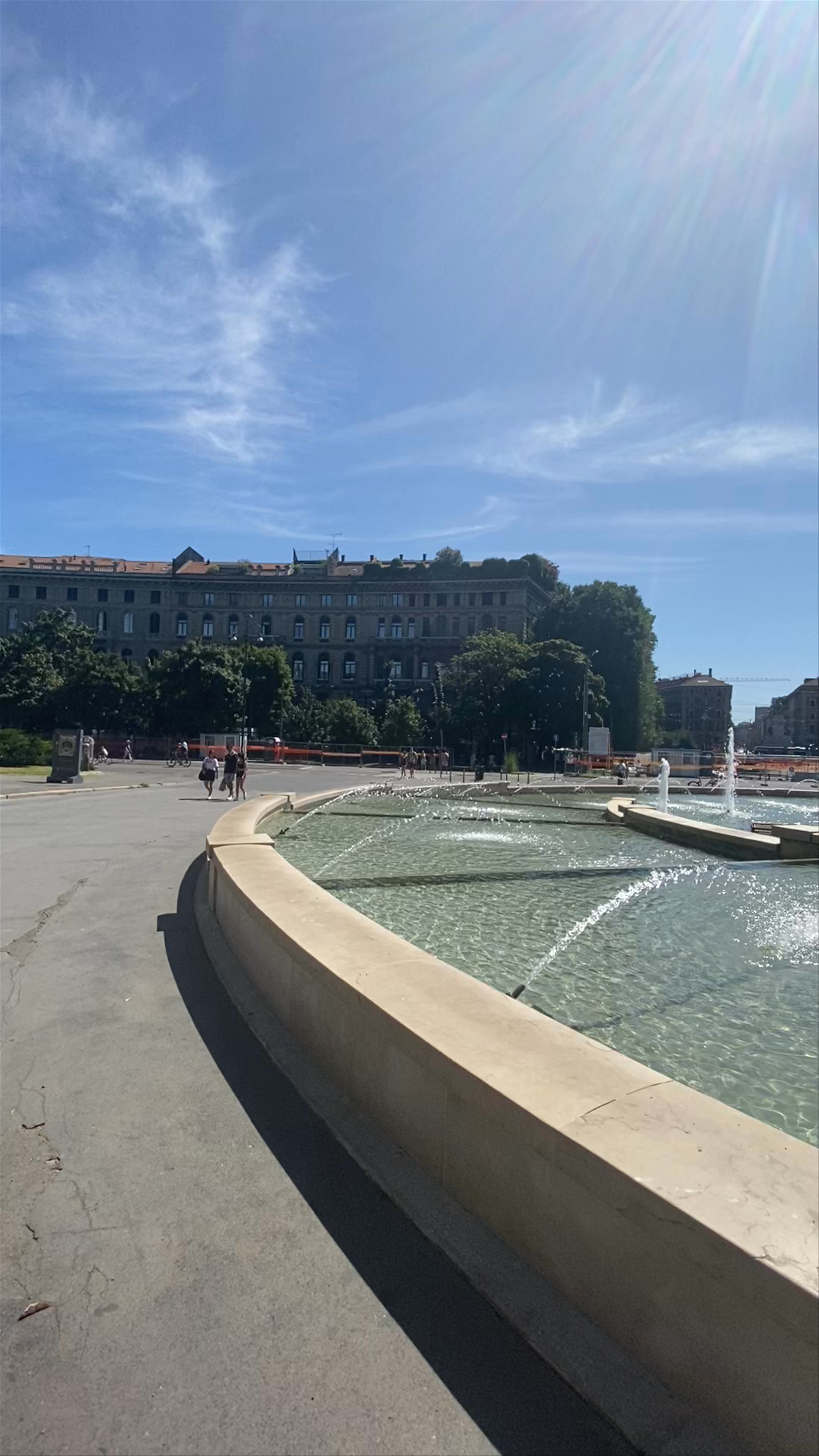 Sunny Summer Afternoon at Piazza Castello Fountain in Milan