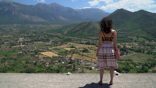 Woman looking at the countryside