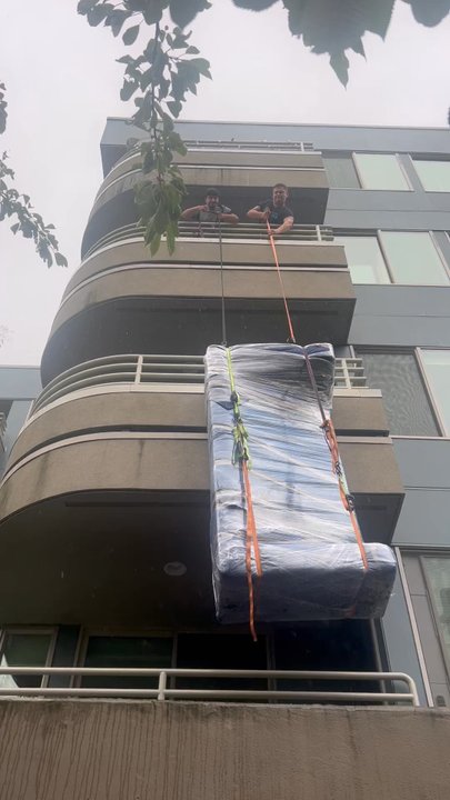 Uplift Movers - Pulling the couch up three stories in the rain. - Movers Near Me - Seattle, Washington