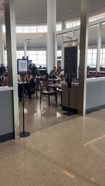 Emeril’s Table - Hostess station for sitting area - Seafood Near Me - Kenner, Louisiana