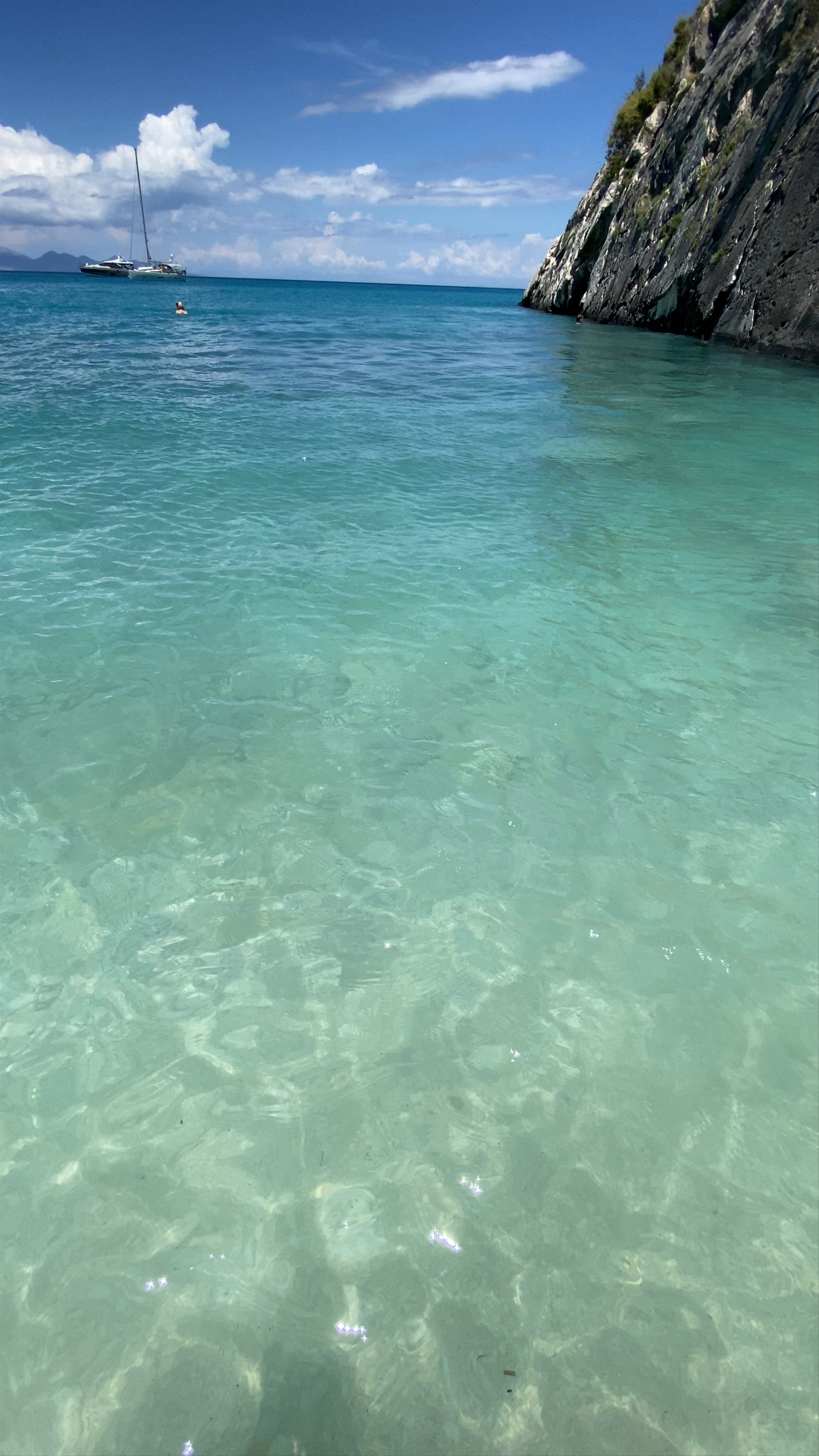 Xigia Beach: Crystal Clear Waters and Majestic Cliffs in Elation, Greece