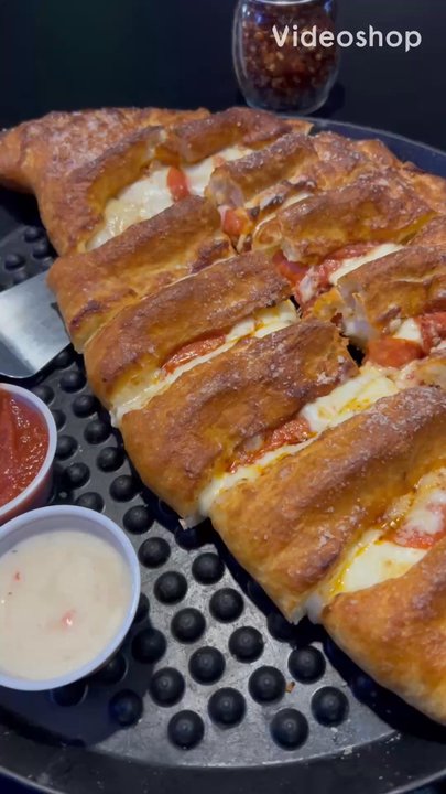 Moudy's Bar & Grill - Pepperoni Calzone - Bars Near Me - O Fallon, Missouri