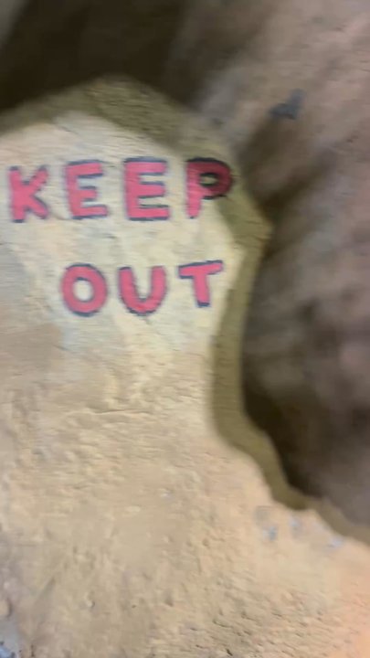 Lost Caverns Adventure Golf - She did technically KEEP OUT just thought the angle would be funny. Catching her in a sticky situation - Mini Golf Near Me - Orlando, Florida