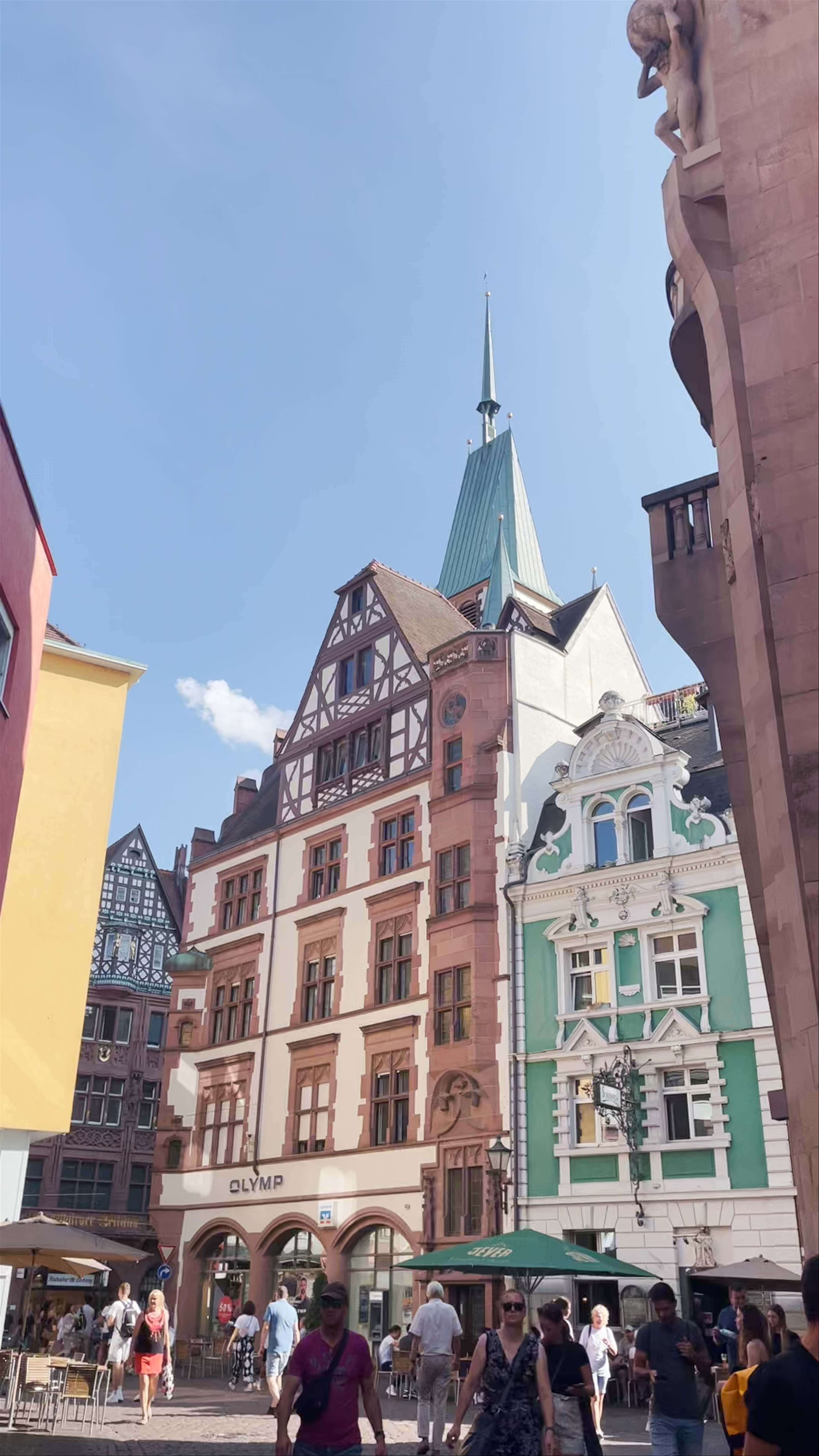 Sunlit Stroll through Historic Konviktstraße in Freiburg im Breisgau