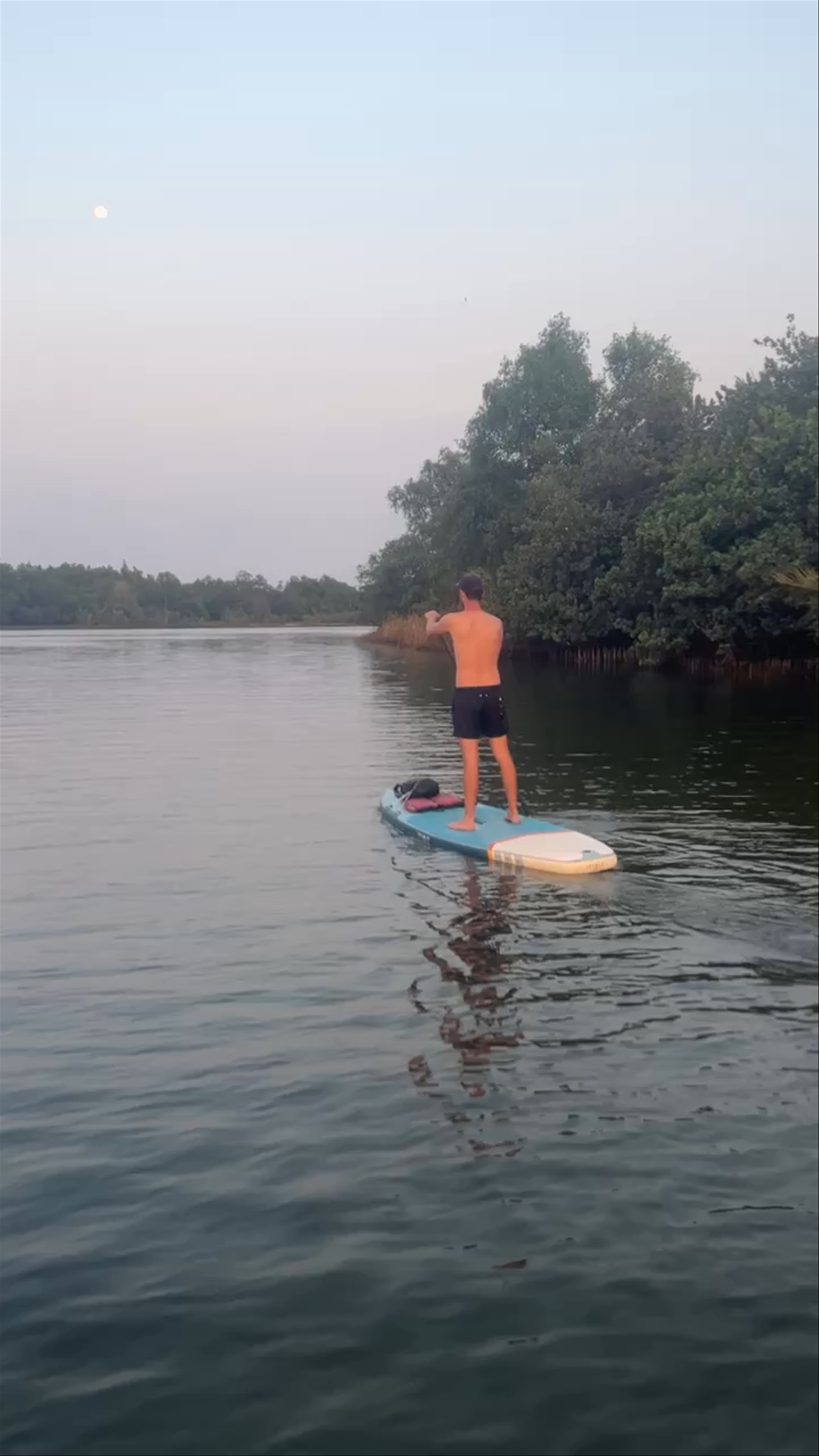 Stand-Up Paddleboarding at Riverside Kampot: Tranquil Sunset Escape