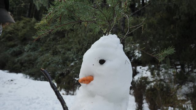 Decorating a snowman