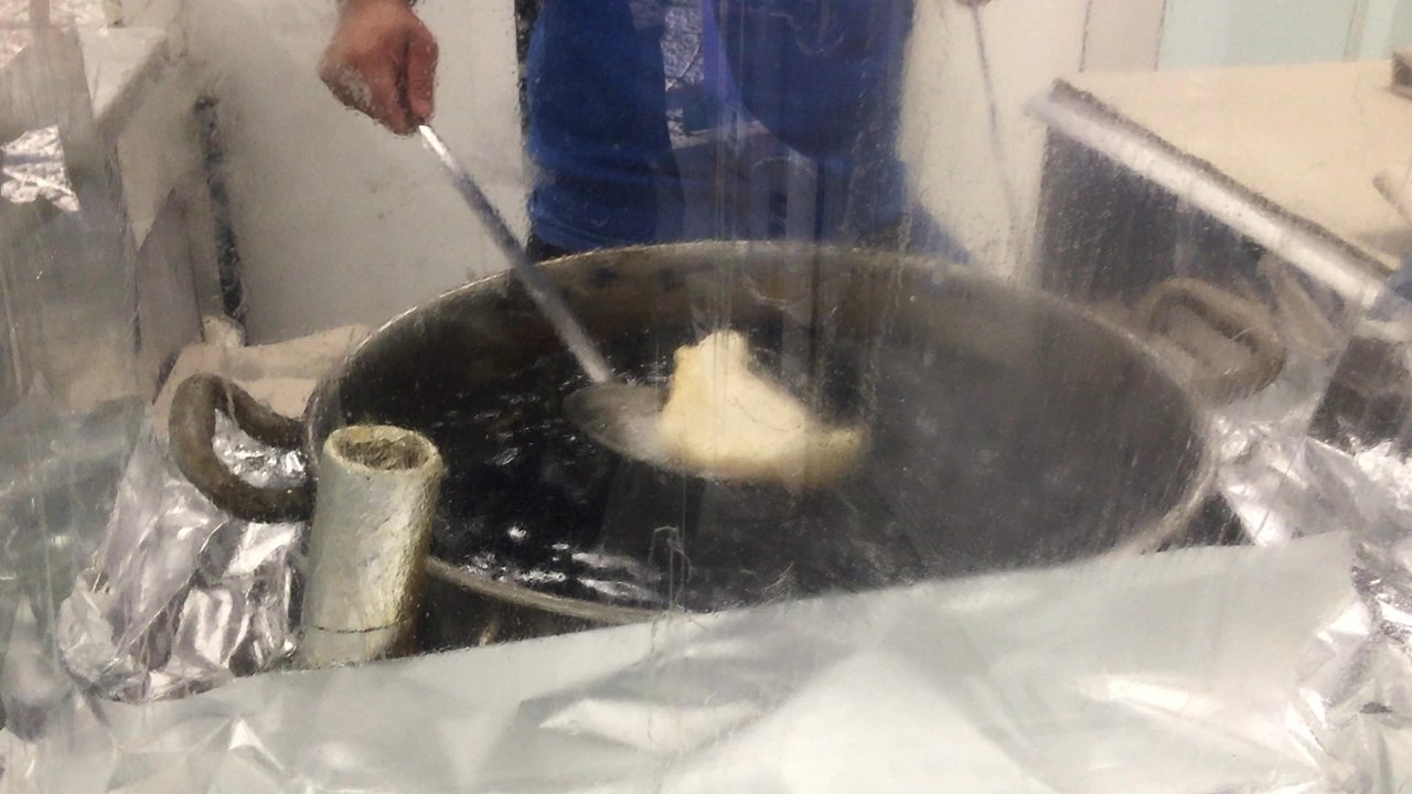 La Masardona - Frying that pizza. - Pizza Near Me - Naples, NA