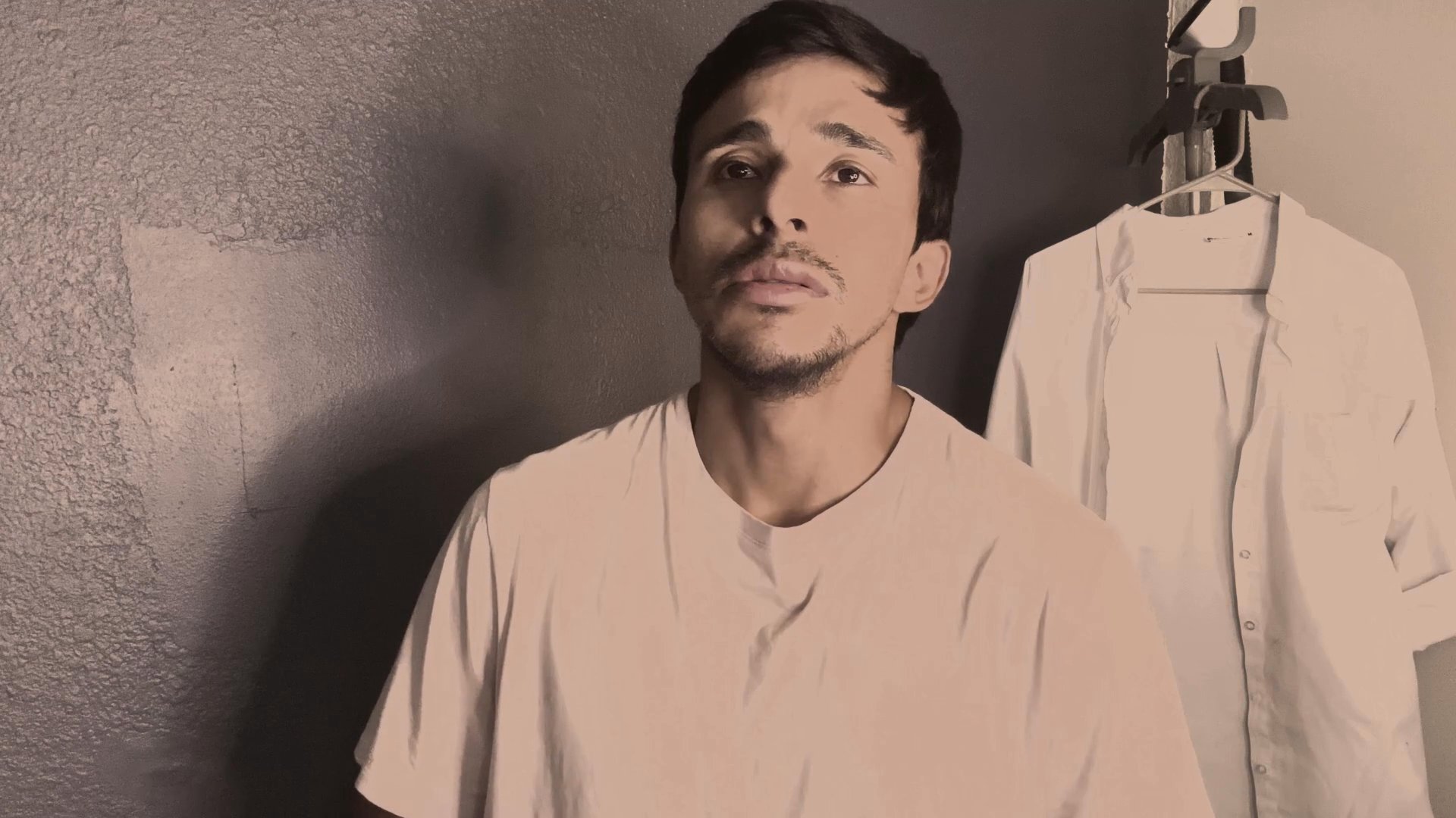 Two individuals engage in a sequential dialogue, alternating frames while speaking directly to the camera.
