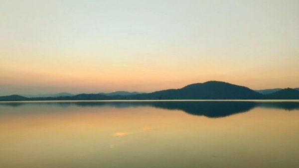 Photo of Sunset behind mounta