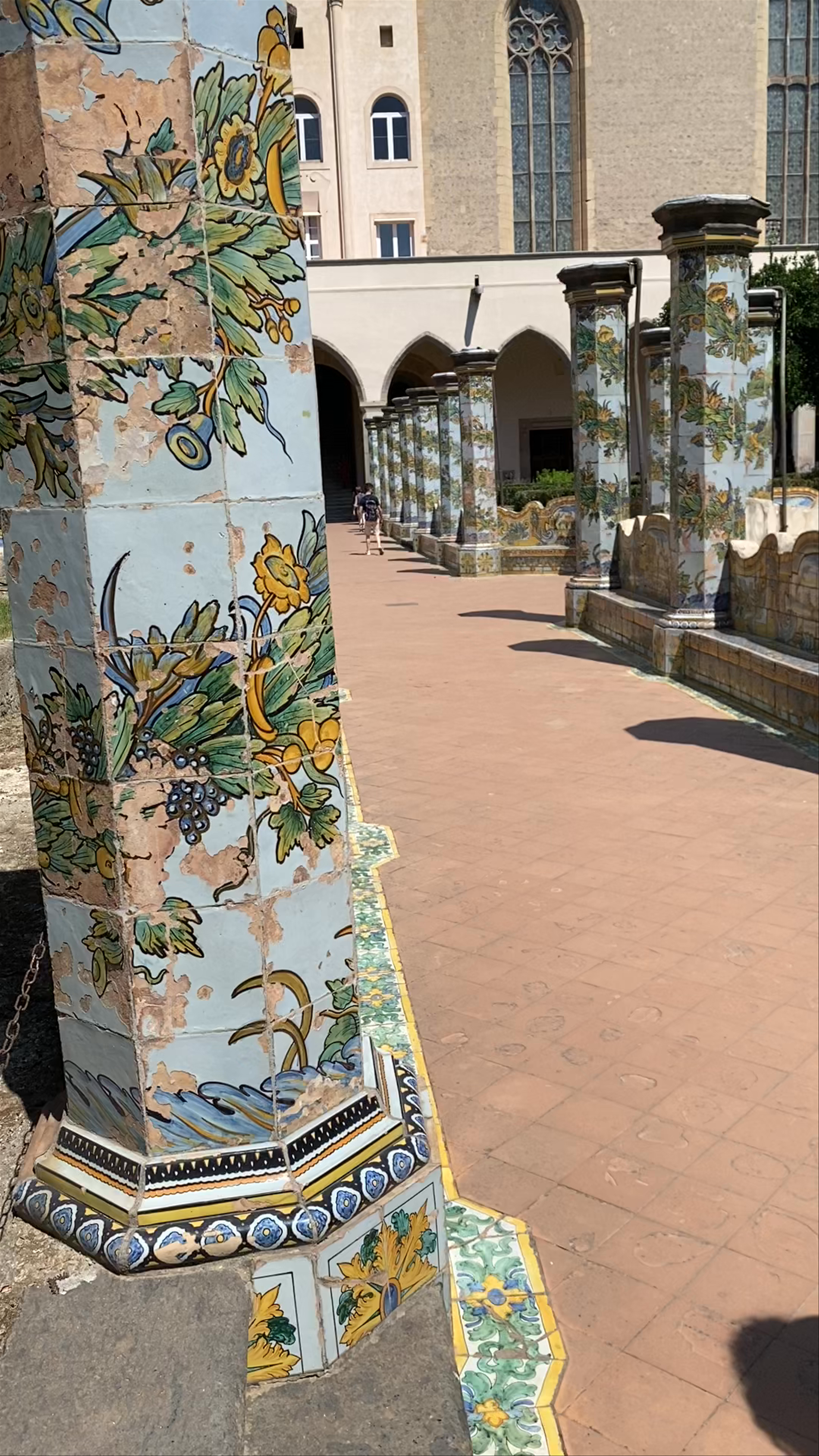 Santa Chiara Cloister: Ceramic Pillars and Historic Charm in Naples