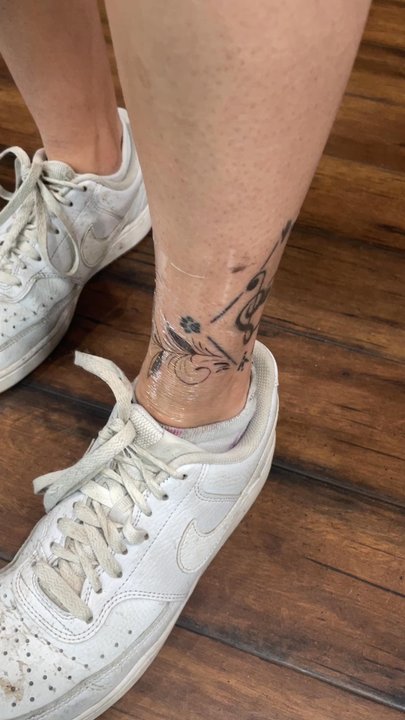 Main Ave Tattoo - The stuff in the diamond was my old tattoo but the vines and leaves were all Chris's freehanded work! - Tattoo Near Me - Spokane, Washington