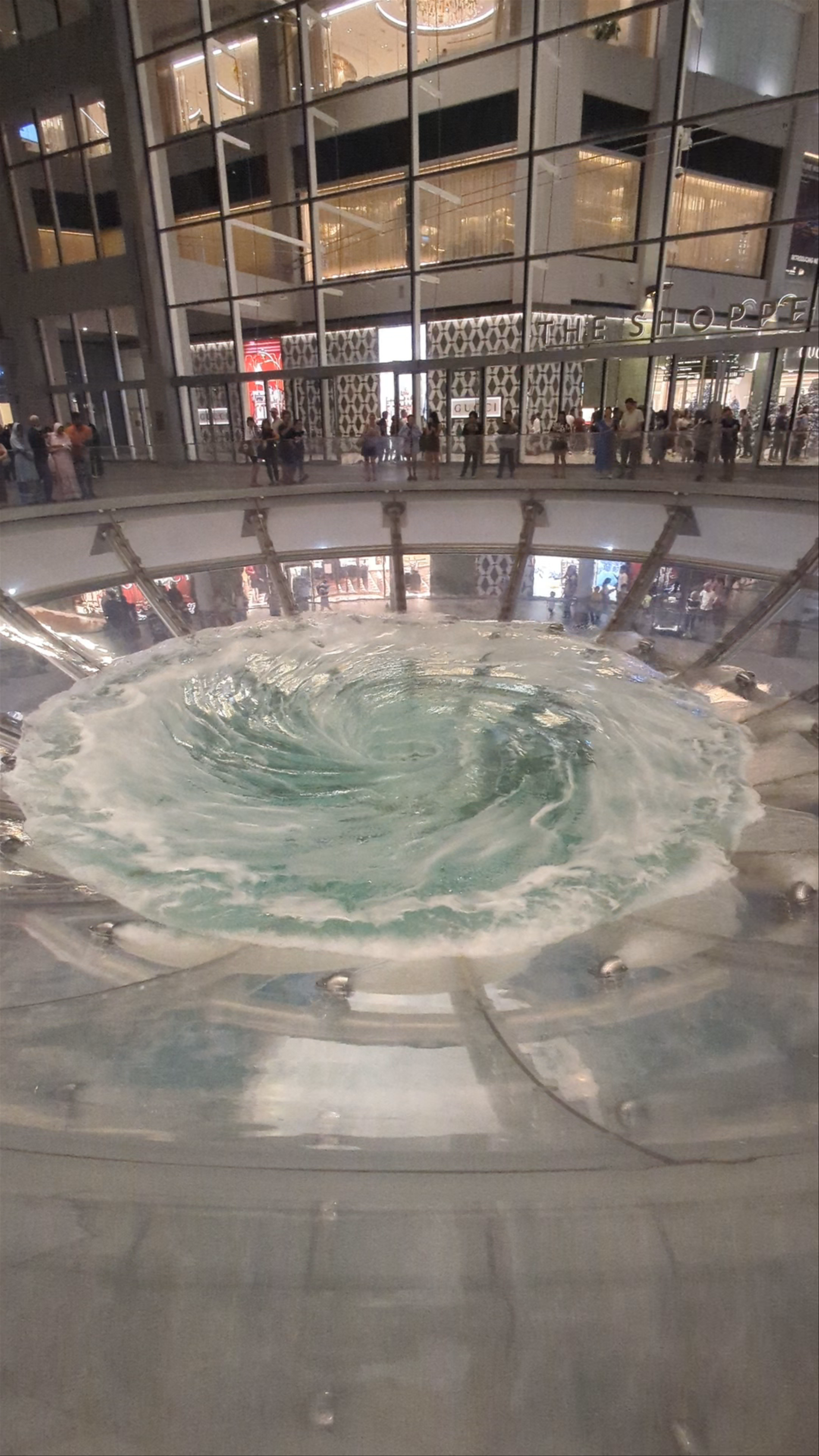 Mesmerizing Water Vortex at Rain Oculus - Marina Bay Sands, Singapore