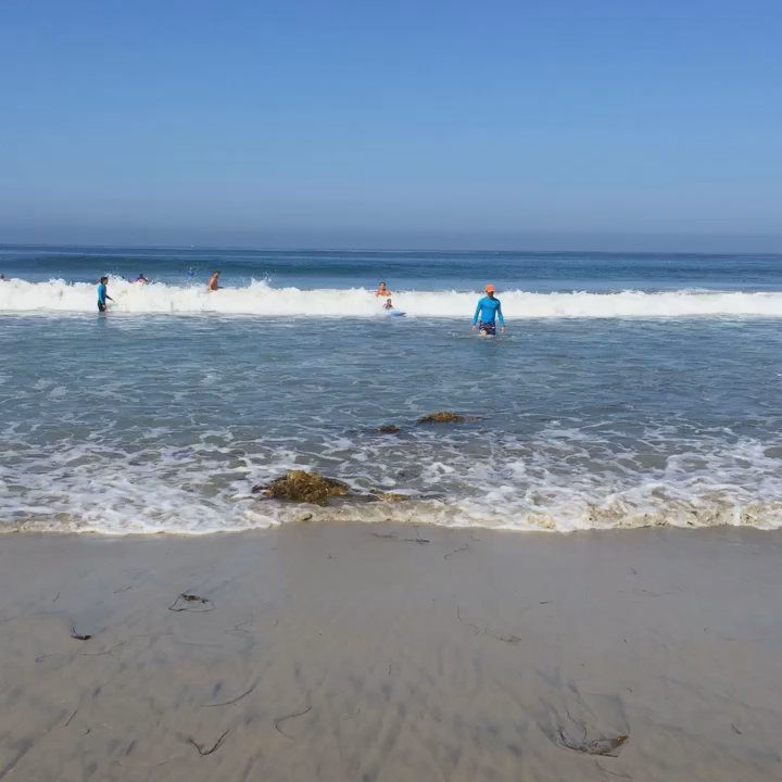 Surfin Fire Surf School - Riding a wave all the way in! - Surf Schools Near Me