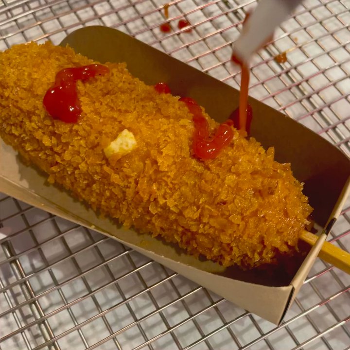 Jongro Rice Hotdog - Ketchup. Mozzarella cheese hotdog. $4.49 + tax + tip - Hot Dogs Near Me - Flushing, New York