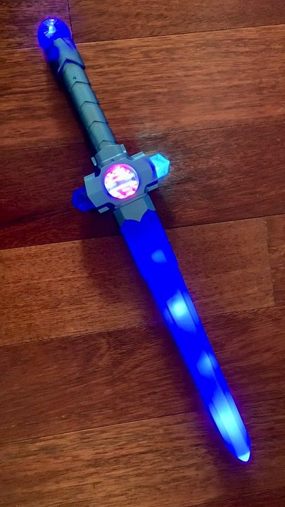 The Big Shop - spinning ball light up sword powered on - Toy Stores Near Me - Carlsbad, California