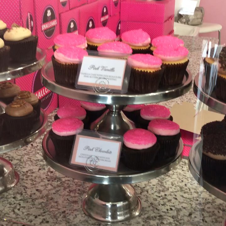 Smallcakes - These are just some of the cupcakes on display at the counter. - Cupcakes Near Me - Rosenberg, Texas