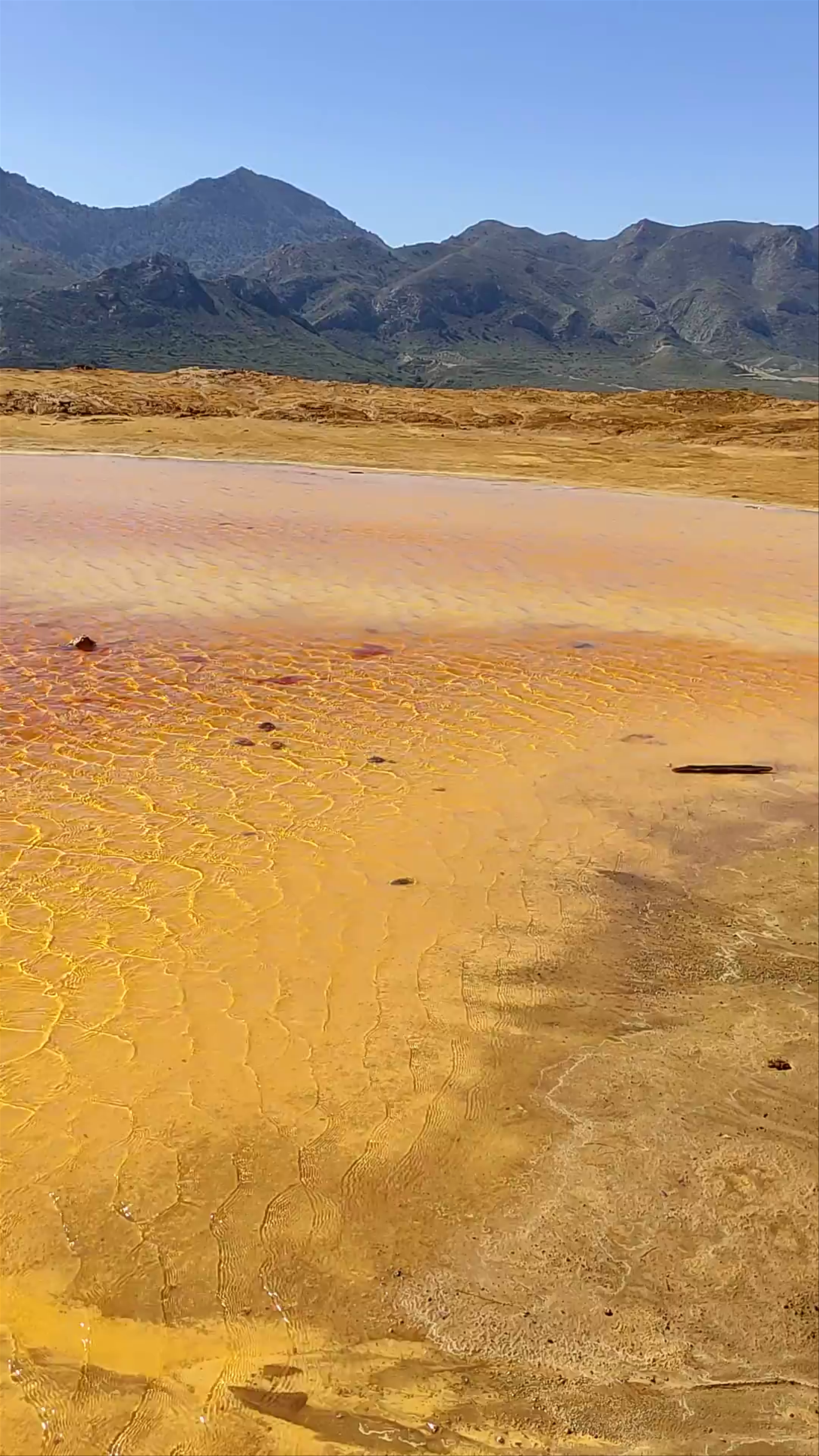 Minas de Mazarrón: Vibrant Thermal Pools with Mountain Backdrop