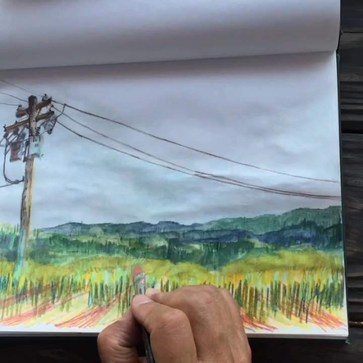 Unti Vineyards - Relaxing with a glass of wine & sketching the vineyard at UNTI - Wineries Near Me - Healdsburg, California