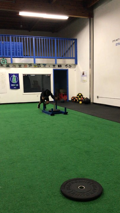 Performance Strength Lab - Weighted Sled Work (son's sneakers kept coming off, so Coach Mark had him use the harness and do Sled Pulls instead). - Fitness & Instruction Near Me