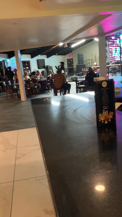 Mariscos La Ceiba - I reallly enjoy live music. This dude is captivating. Would definitely pass round 1 on American Idol. - Seafood Near Me - Modesto, California