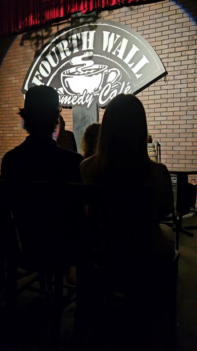 Fourth Wall Comedy Cafe - Empty seats, and agro short white guy w glasses - Comedy Clubs Near Me - Los Angeles, California