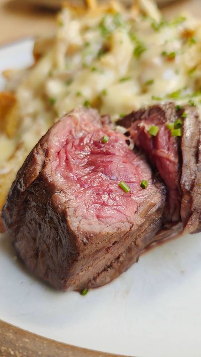 Stock Cafe - Video Clip of my Hanger Steak medium rare main course. - Cocktail Bars Near Me - Roanoke, Virginia