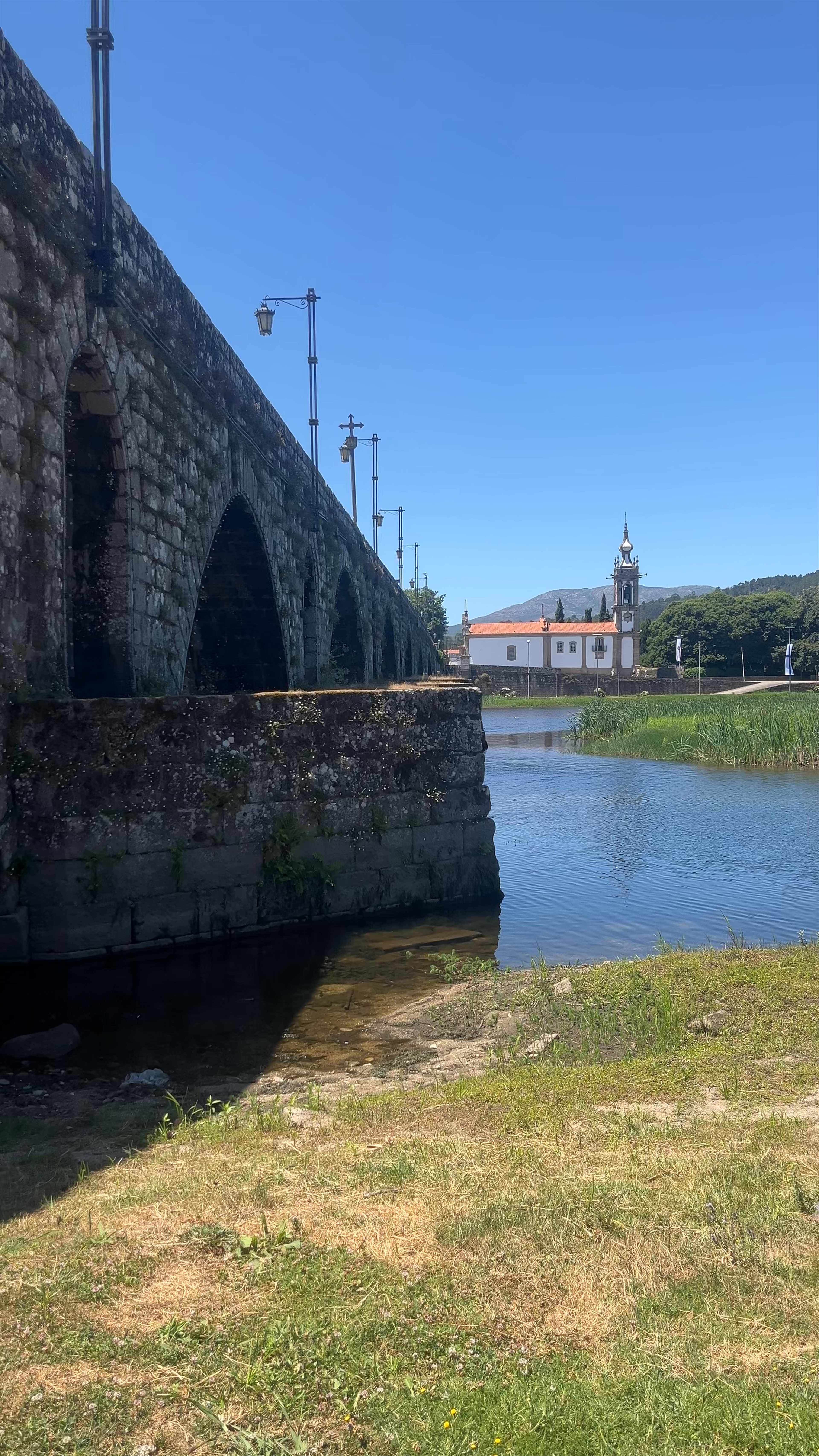 Historic Ponte de Lima Bridge in Portugal | Stone Architecture & Riverside Serenity