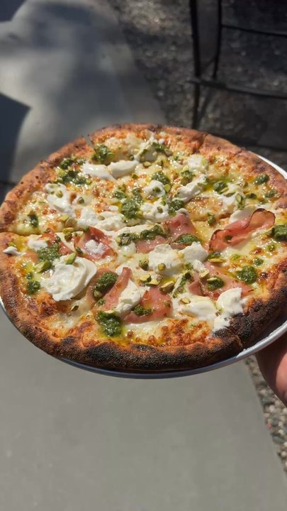 RMV Cellars - The pistachio and mortadella pizza (half mortadella in this case) is a top choice at RMV Cellars. - Beer Bar Near Me - West Park, New York