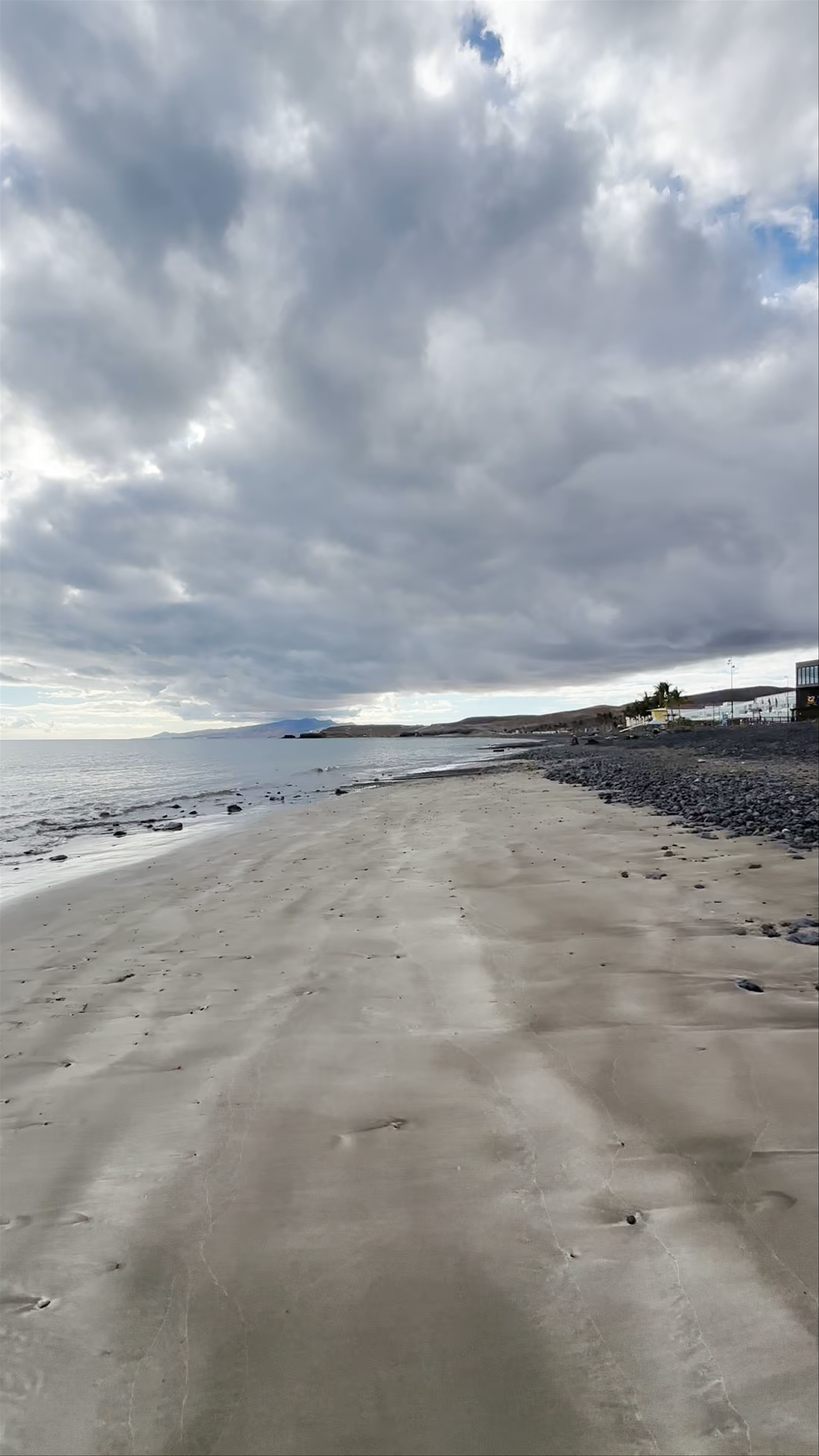 Moody Coastal Walk at Playa de Tarajalejo, Spain