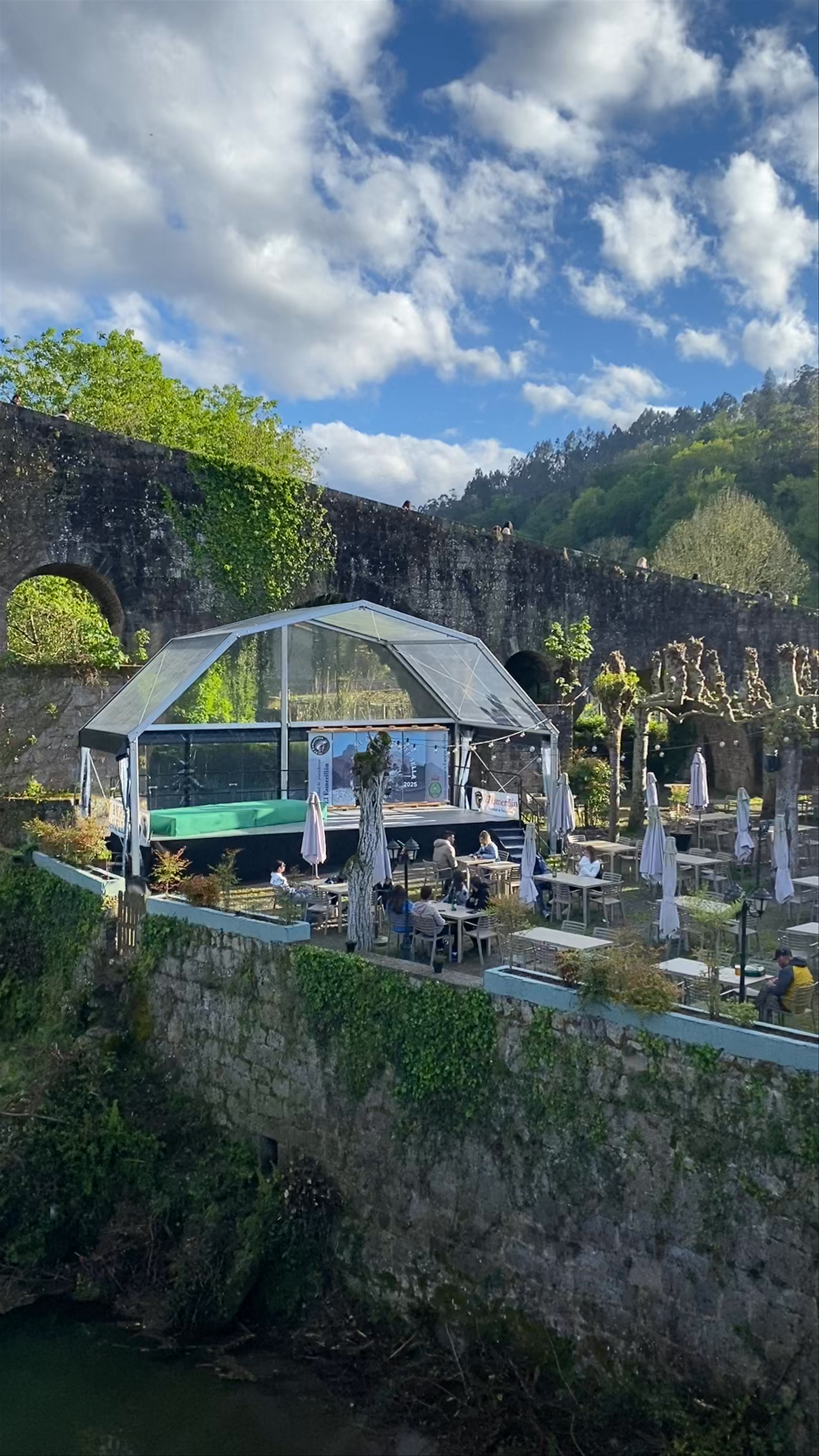 Roman Bridge (Puente Romano) in Cangas de Onís, Spain: Timeless Beauty and Lush River Views