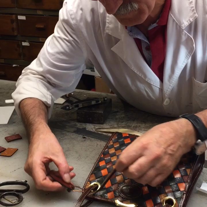Leather Craftsman - Adding the final personalization... Hand stamped/branded name for the lucky new owner of this purse. - Leather Goods Near Me - Rome, RM