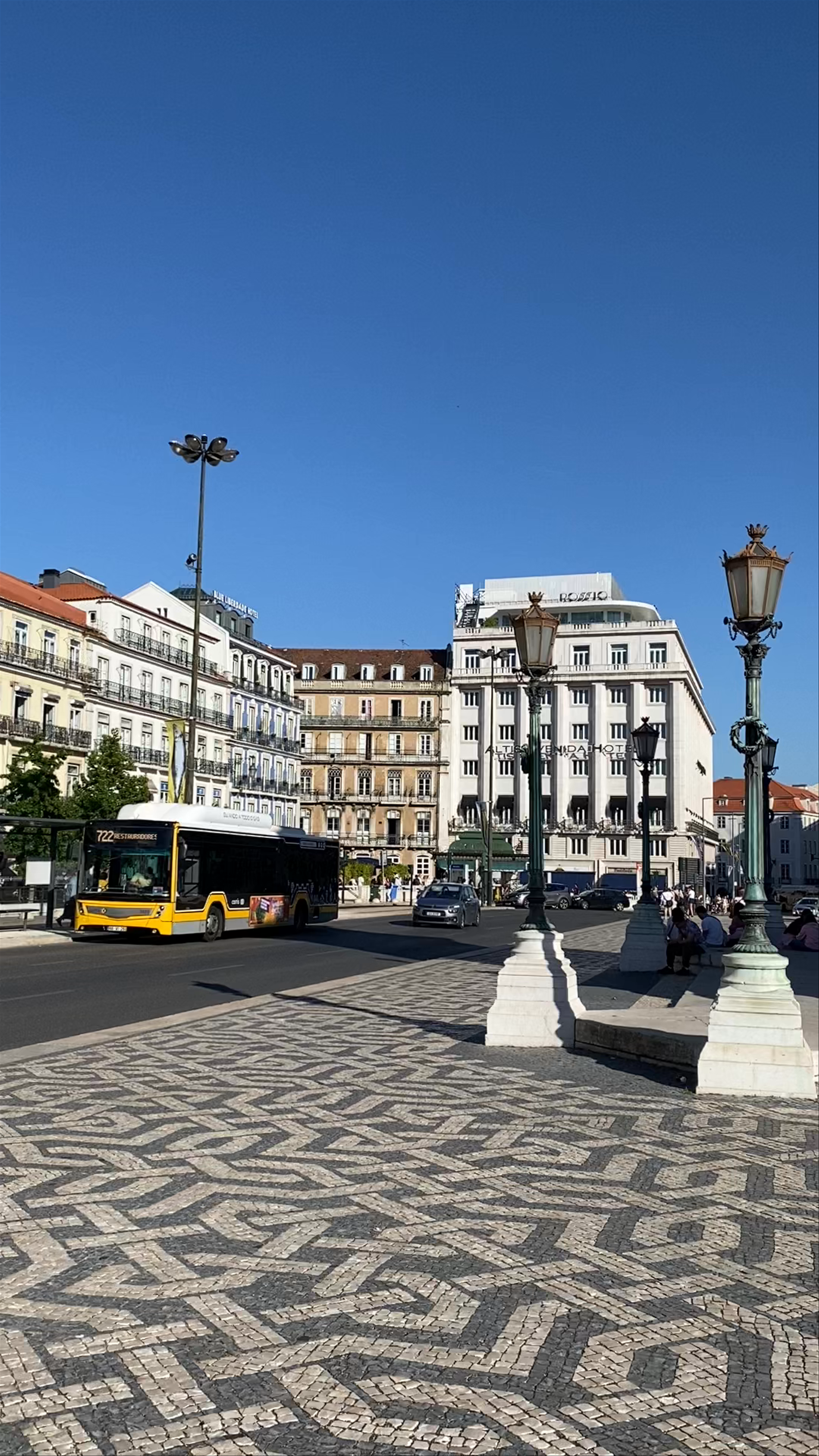 Exploring Restauradores Monument in Lisbon on a Sunny June Day