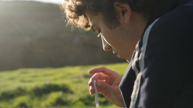 Man lighting a cigarette