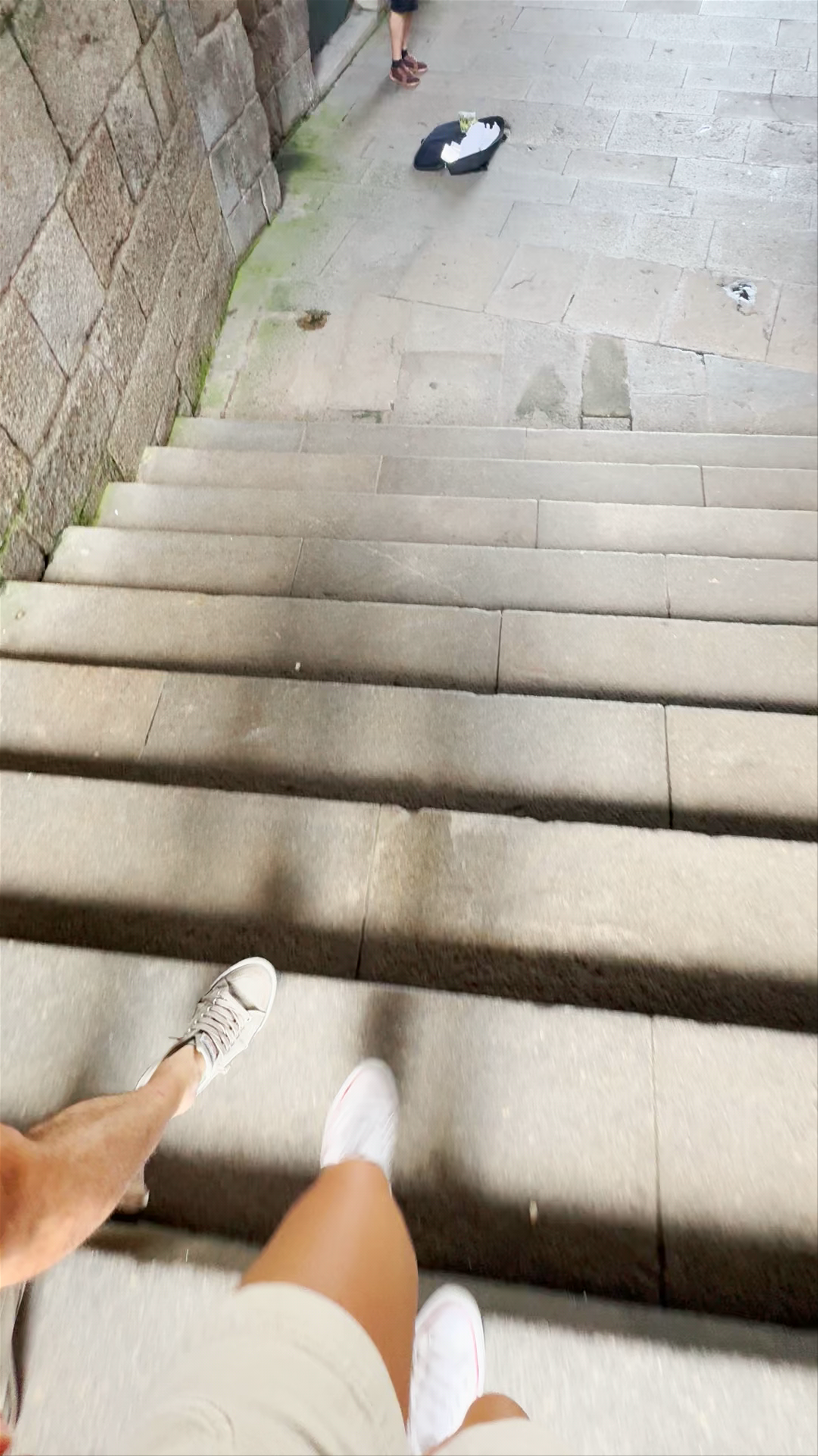 Exploring the Historic Stairs of Plaza del Obradoiro in Santiago de Compostela