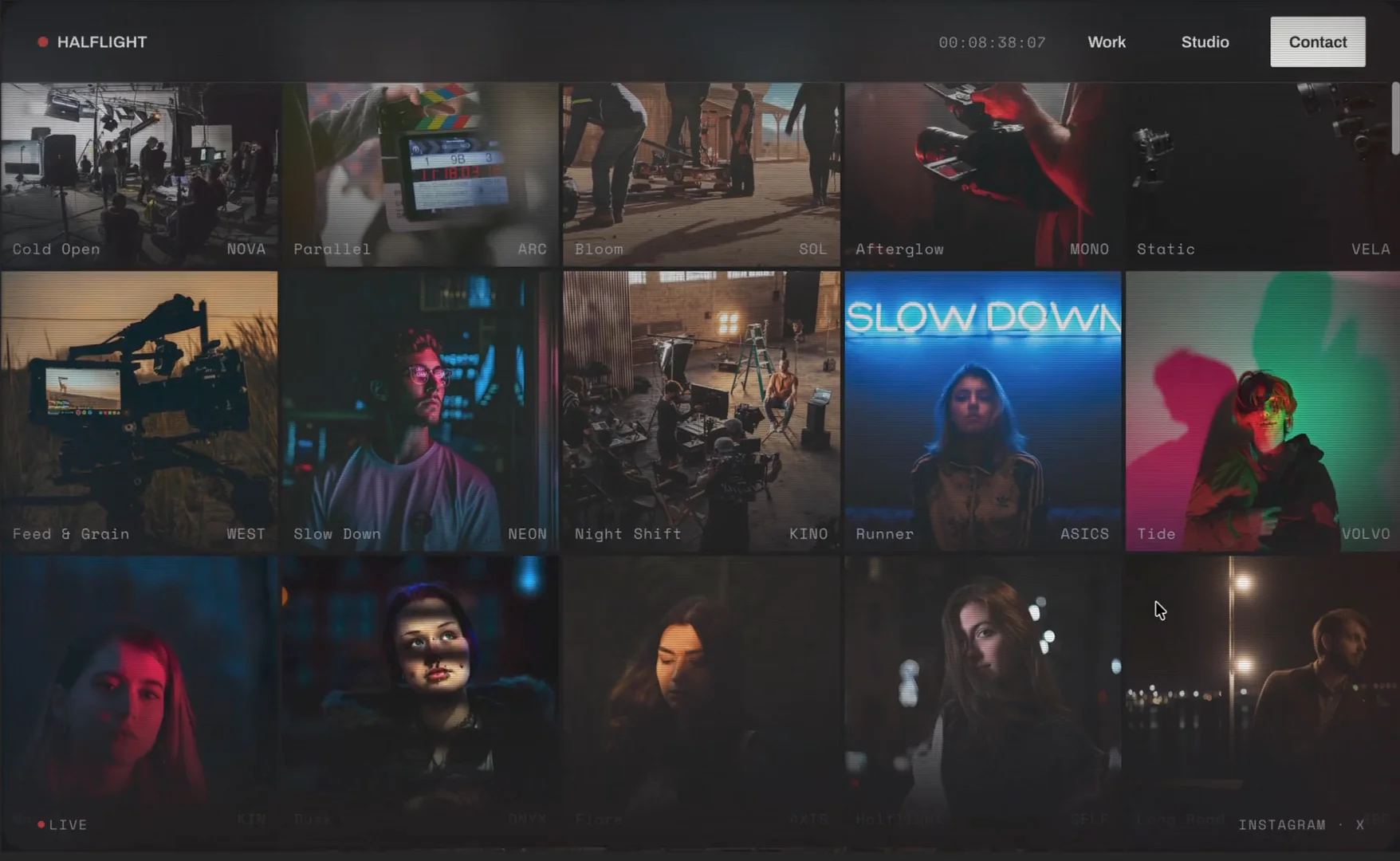 Half Light Film puts a video studio's whole catalogue on one page. A wall of fifteen films pulls back from a single frame, and every film plays in a lightbox the moment you click it.