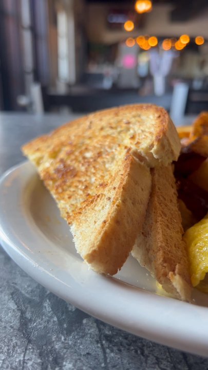 District 7 Grill - Half cooked bacon in my omelette - Burgers Near Me - Houston, Texas