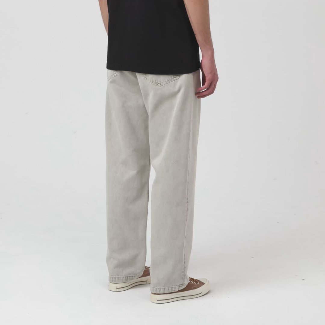 Model wearing a pair of Carhartt WIP Landon Pants