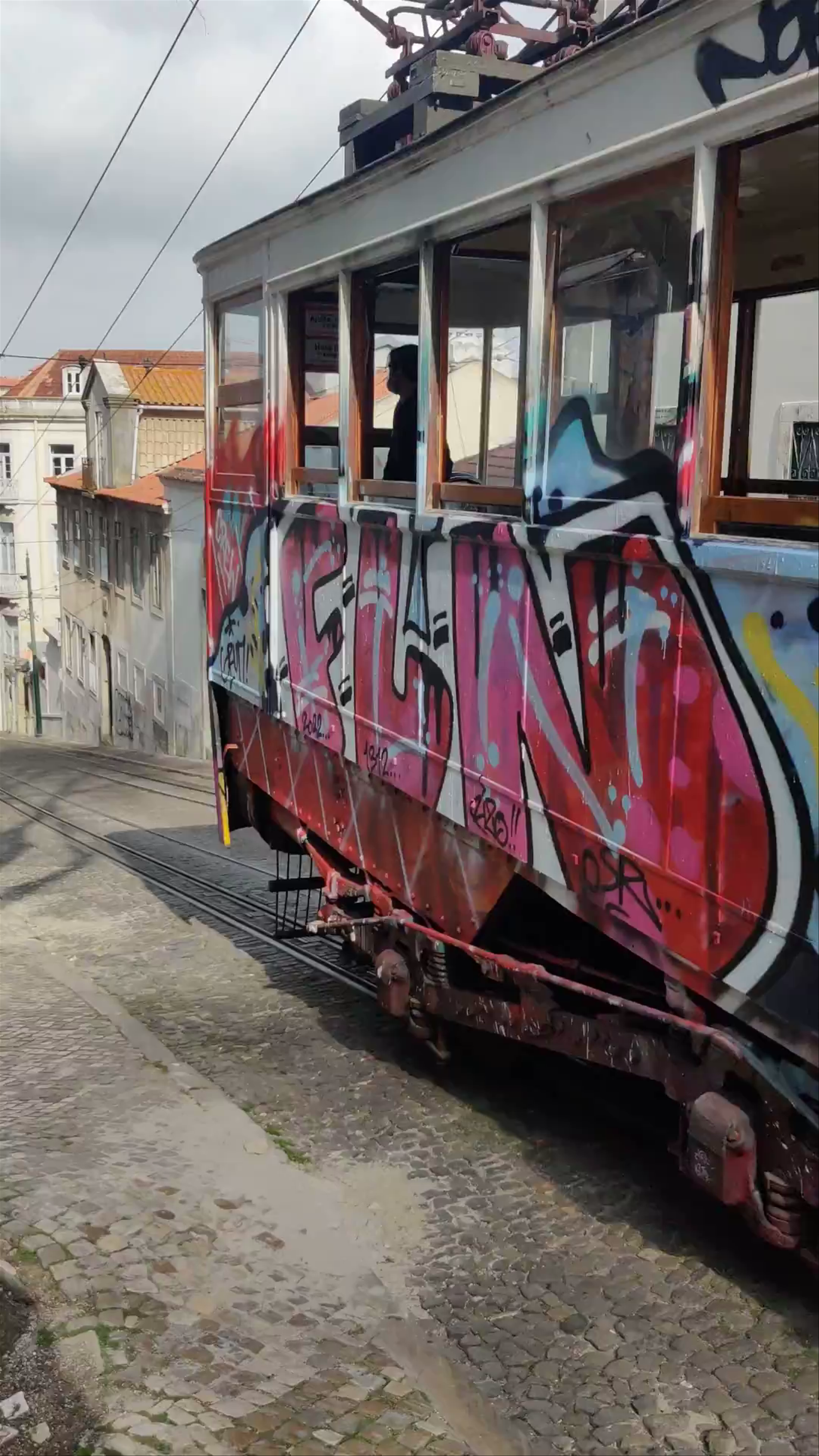 Tram 28 Ride: Lisbon’s Iconic Graffiti-Filled Vintage Tram Experience